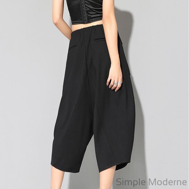 https://www.simplemoderne.com/cdn/shop/products/Simple-Moderne-Relaxed-Fit-Harem-Capri-Pants-with-Maxi-Pockets-EU-size_36-4.jpg?v=1692478504&width=801